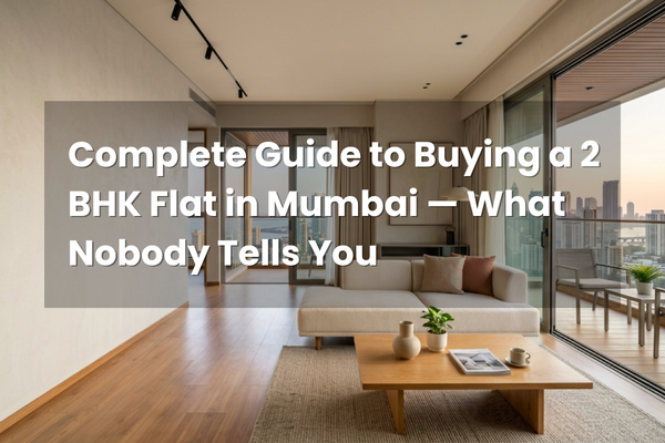 Modern 2 BHK flat interior in Mumbai with living room, kitchen, and city skyline view
